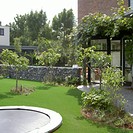 Tuin 7.2 mediterrane tuin met kunstgras en zwembad